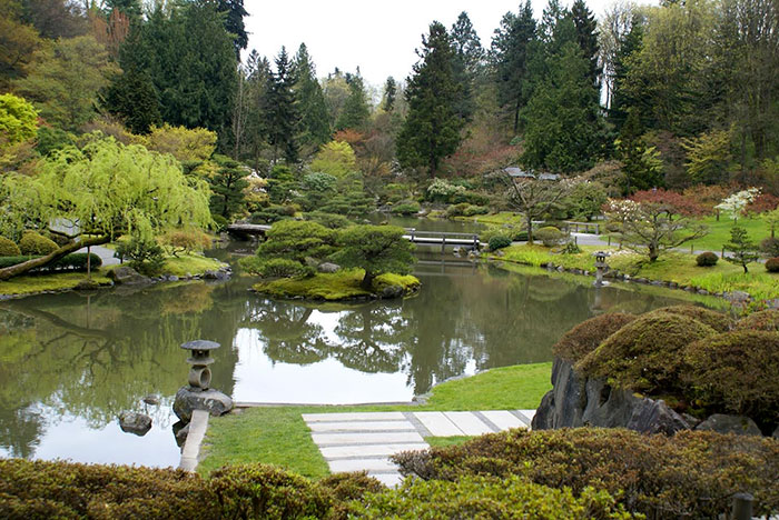 pond with bridge, path and plantings