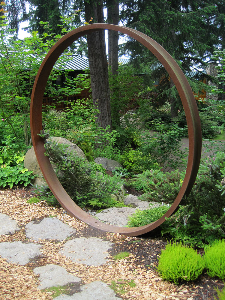 Standing steel ring with a path through it