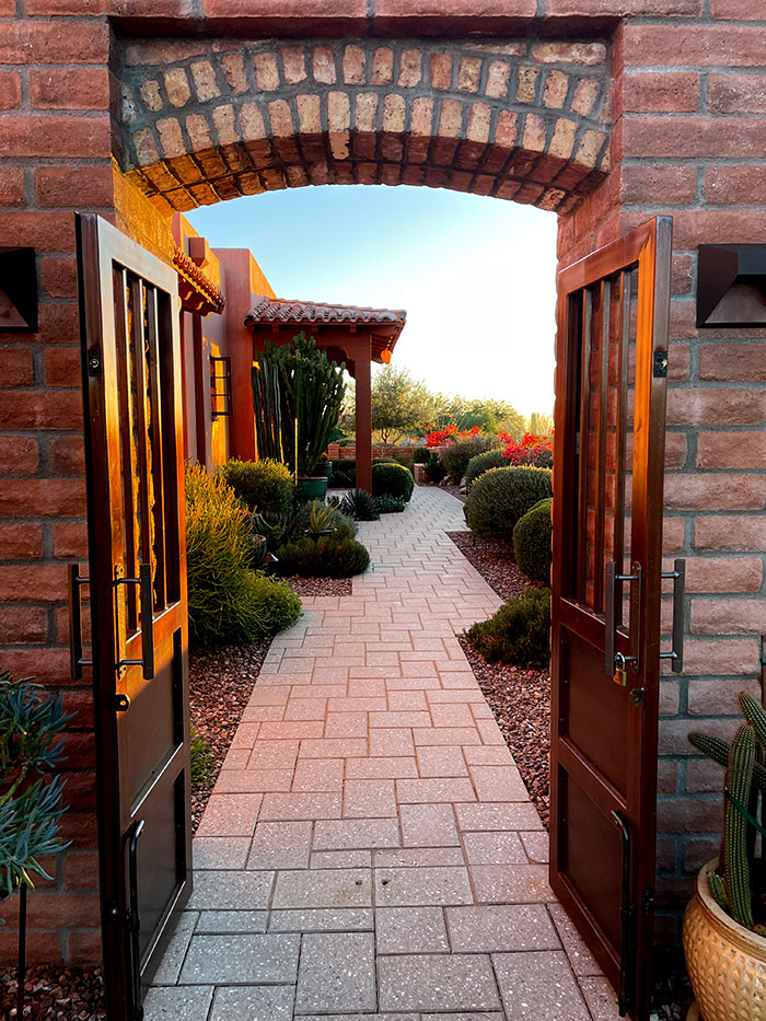 Private home entry courtyard at sunset in Arizona 