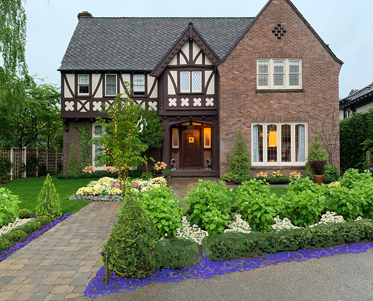 A 3D sketch of a planting design for the entry to a Tudor-style house 