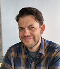 Headshot of Rick Fox in his office at Devonshire Landscapes